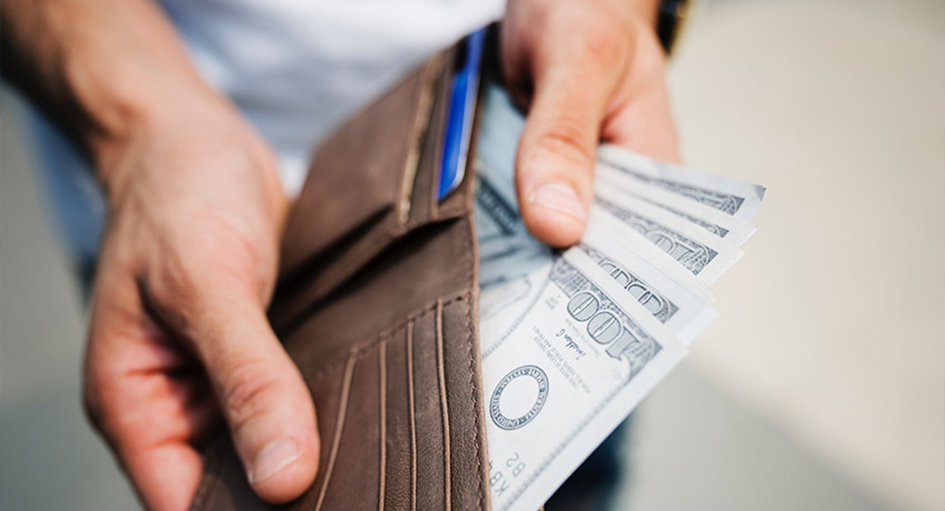 wallet with bills fanned out